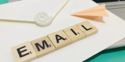 email spelled out on a postcard