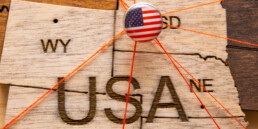 USA flag on the pushpin with red thread
